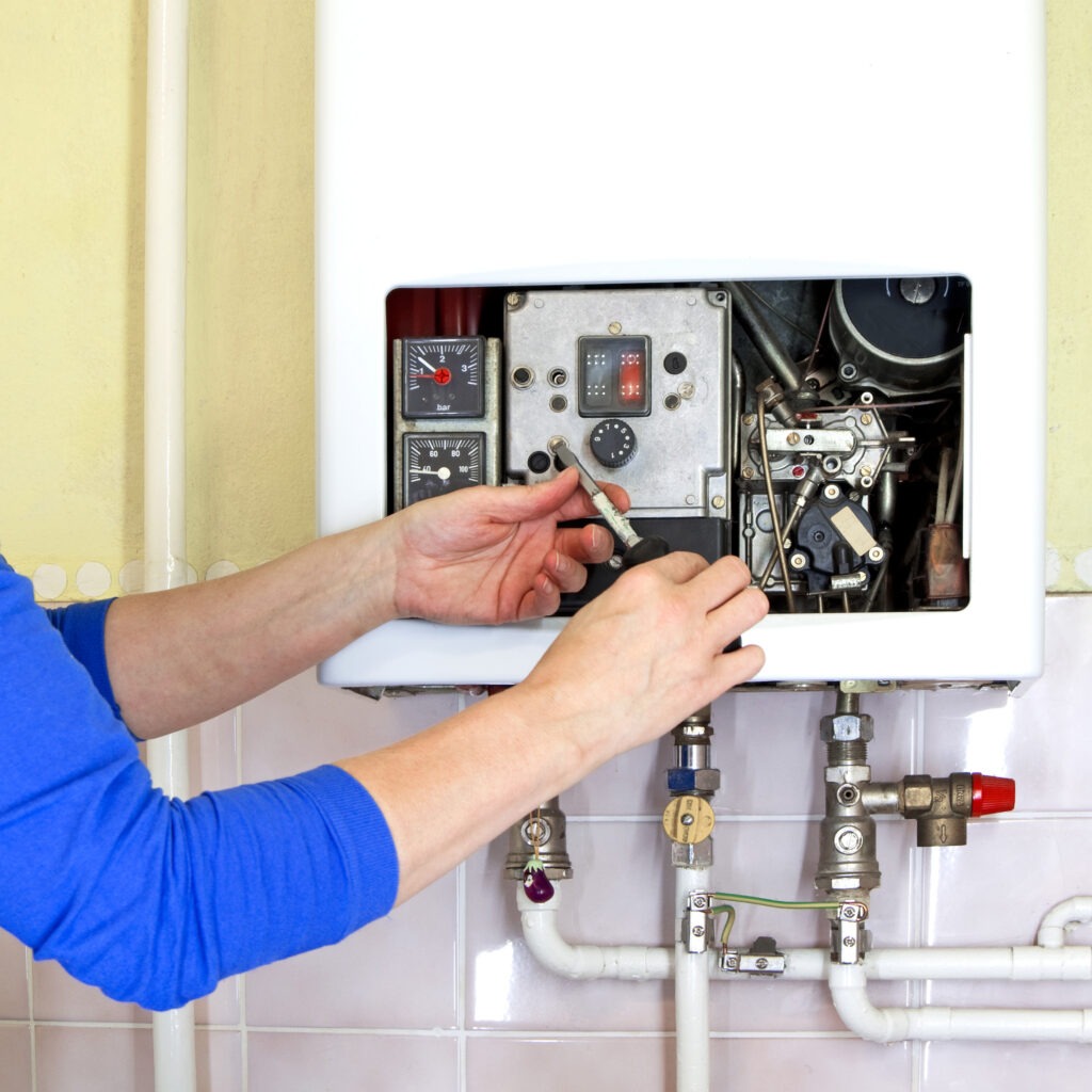 tankless water heater being repaired